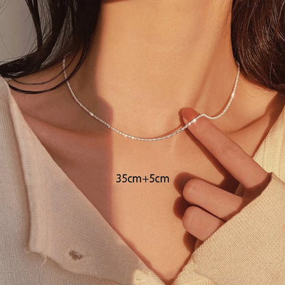 Silver colored glittering necklace for women trendy collarbone chain. 